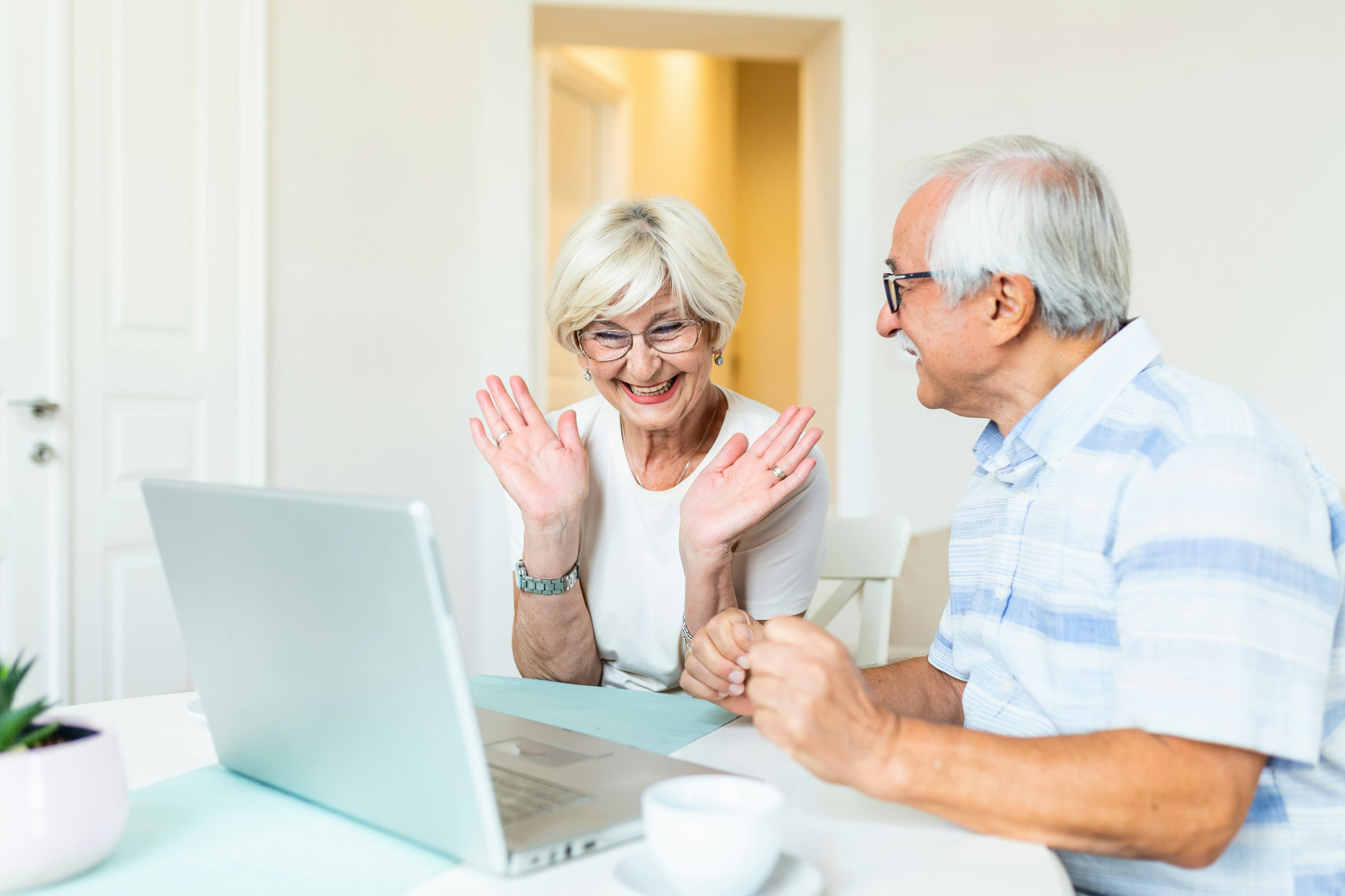 Couple consulting a reverse mortgage specialist